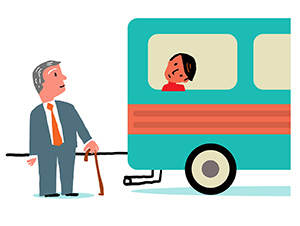 A man with a cane looking at the back of a bus