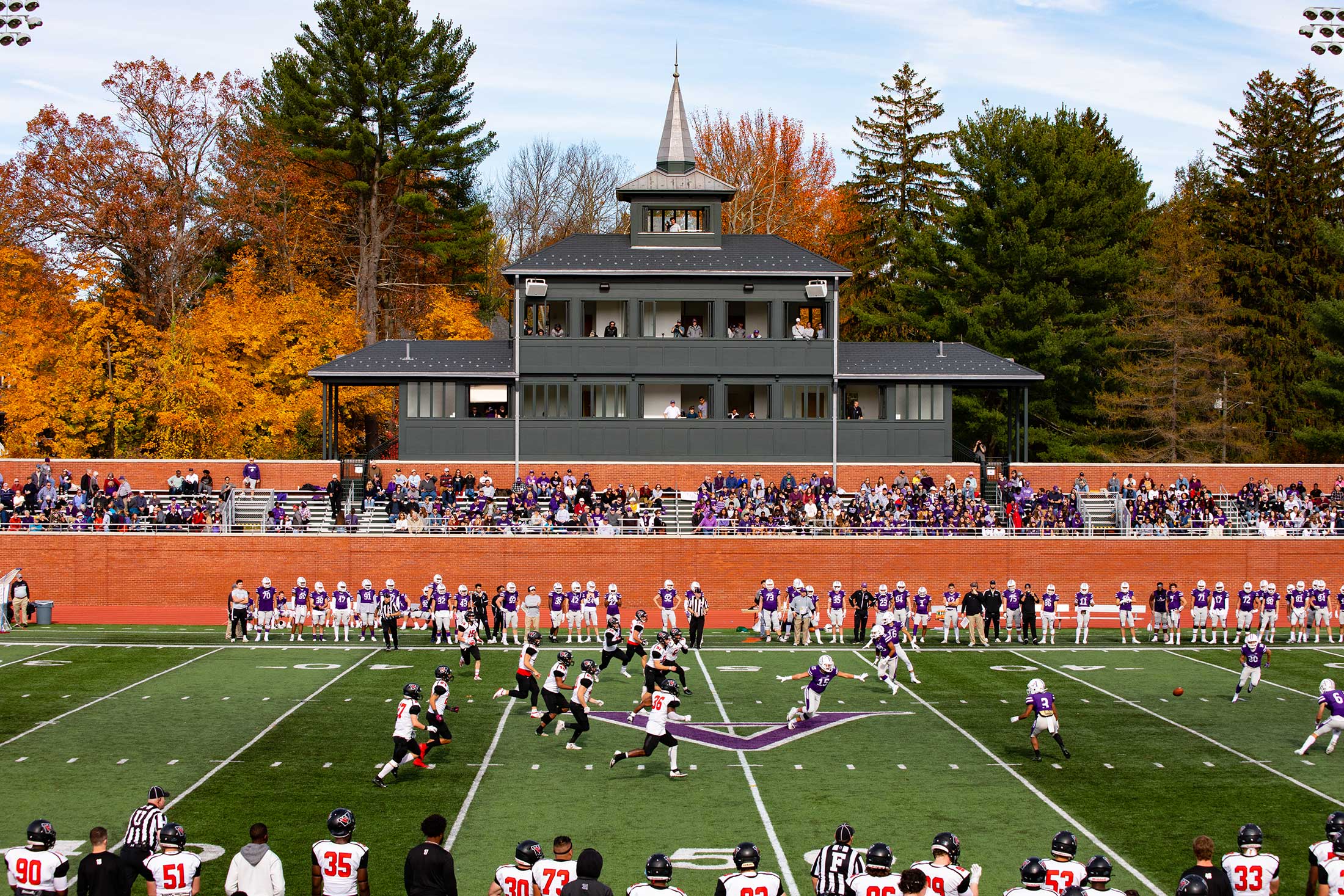 Amherst College's football team in action