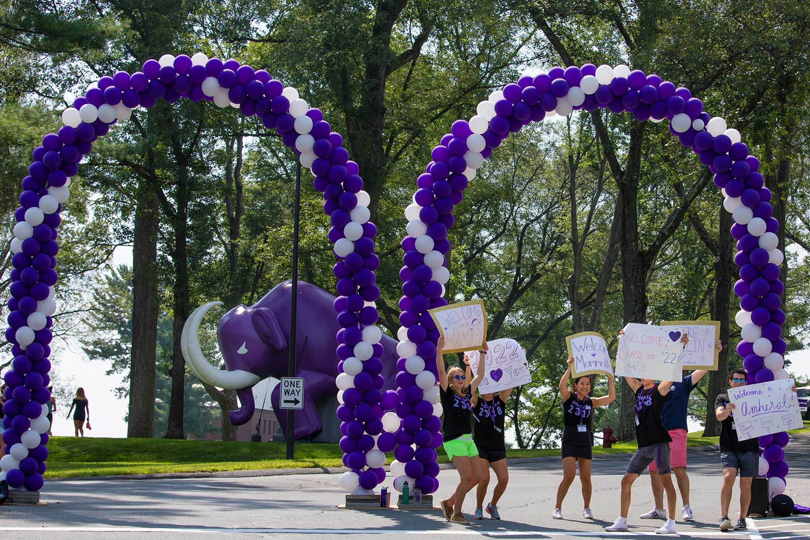 Cars entering the campus were greeted by this cheer squad and the Mammoth mascot.