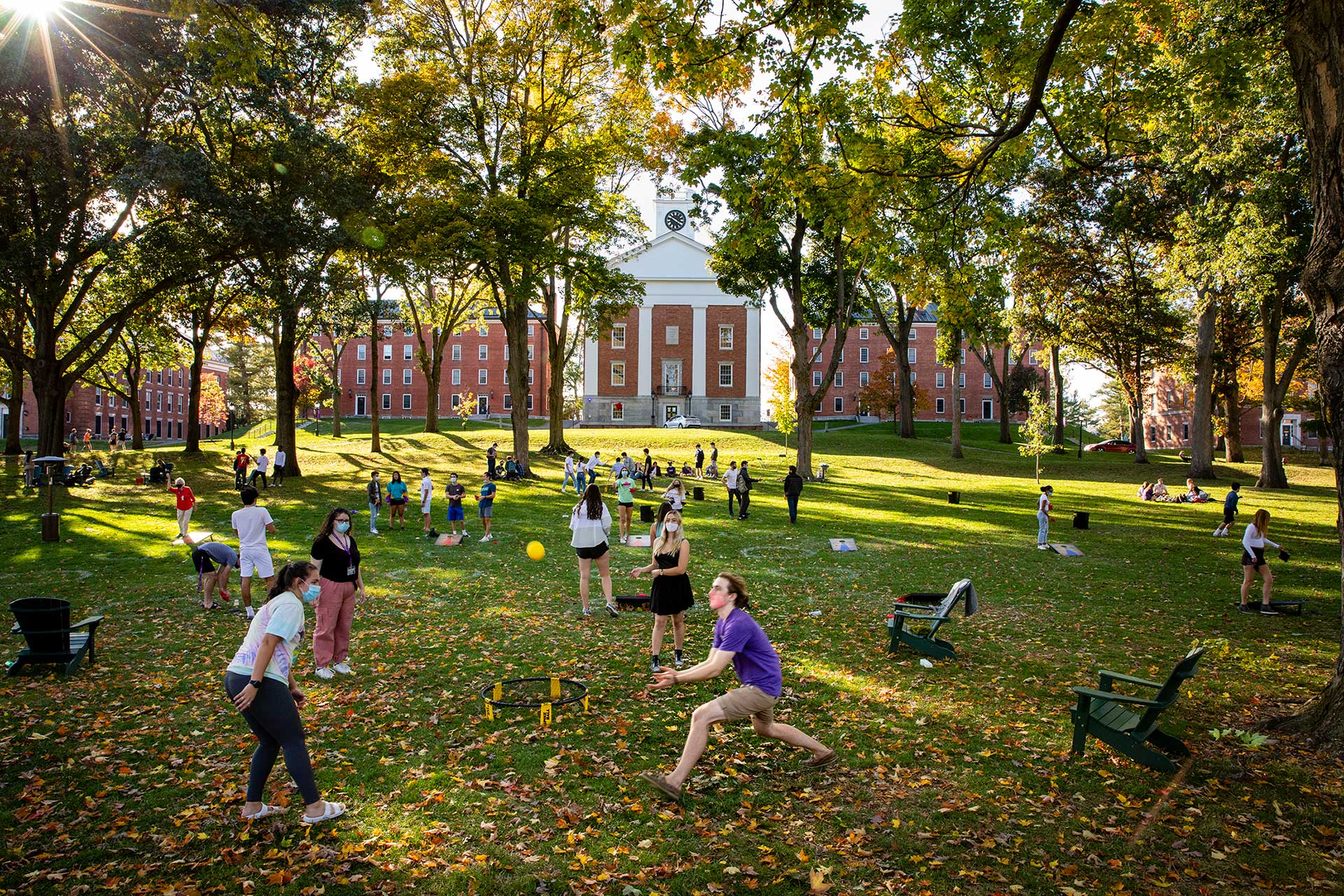 Students enjoying outdoor activities on the main quad of amherst college