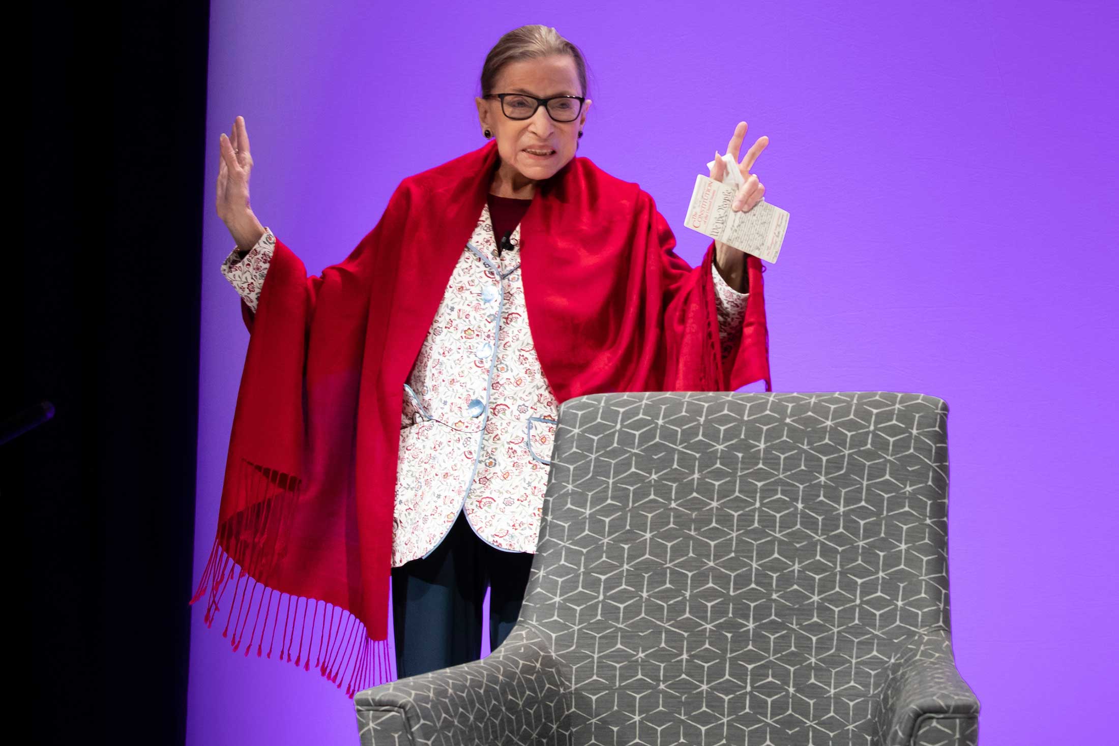 Justice Ruth Bader Ginsburg waving to the audience