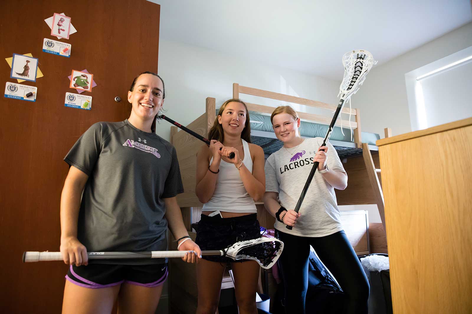 Kathleen Krieg ’20 and Kaitlyn Haase ’19, captains of women’s lacrosse, helping classmate Ashly Tucker ’22 move into James Hall.