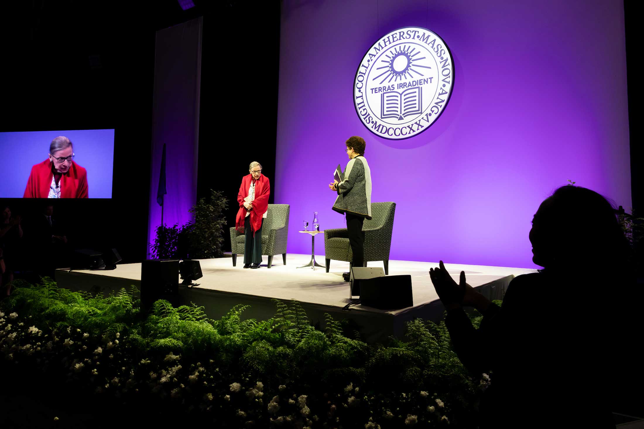 Justice Ginsburg and President Biddy Martin standing on stage side by side