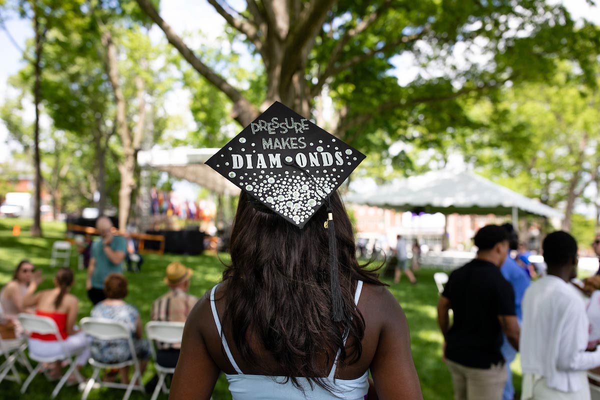 A student with a decorated graduation cap