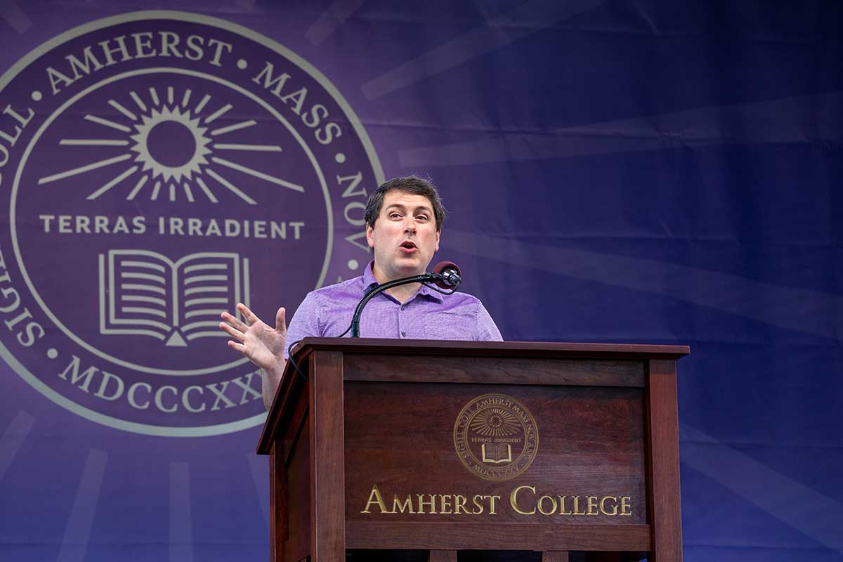 Matt McGann, dean of admission at Amherst College, speaks to the incoming class.