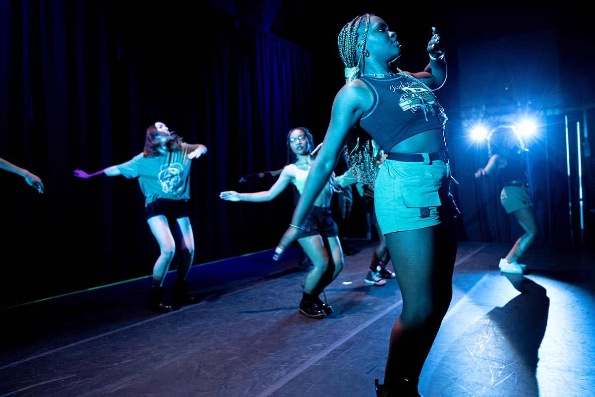 Students perform choreography by ACora Hickson and Corri Hickson titled hot sh*t only.