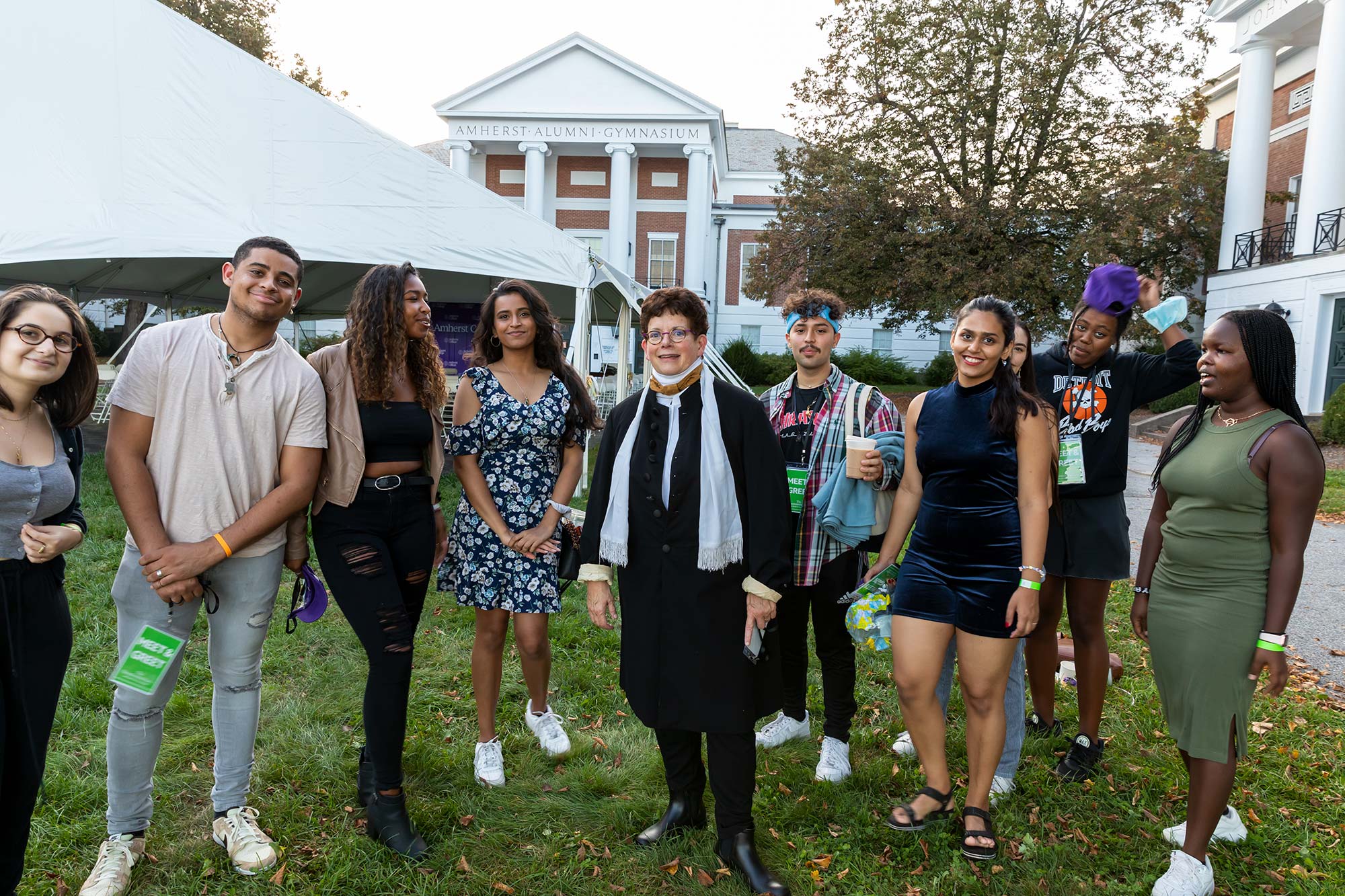 President Martin poses with some students attending the bicentennial party