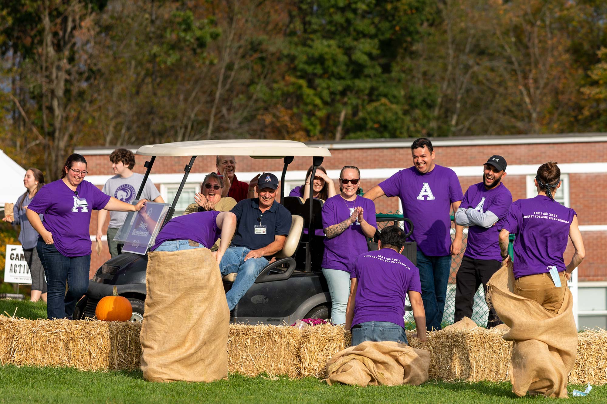 Amherst College staff prepping the academic quad for the bicentennial party