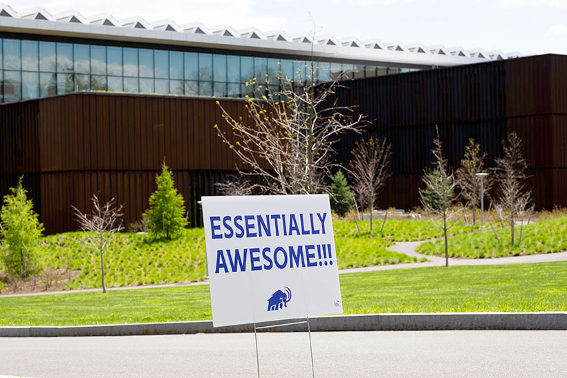 A sign in front of the Science Center that reads essential awesome