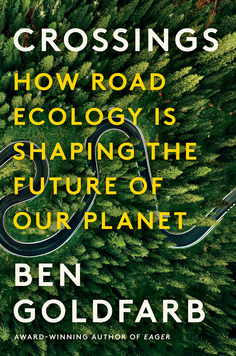 A book cover with the title Crossings: How Road Ecology Is Shaping the Future of Our Planet over a forest