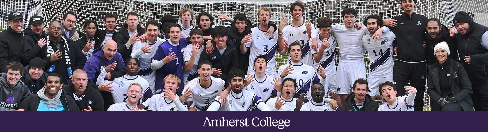 The Amherst College men's soccer team poses for a group photo.