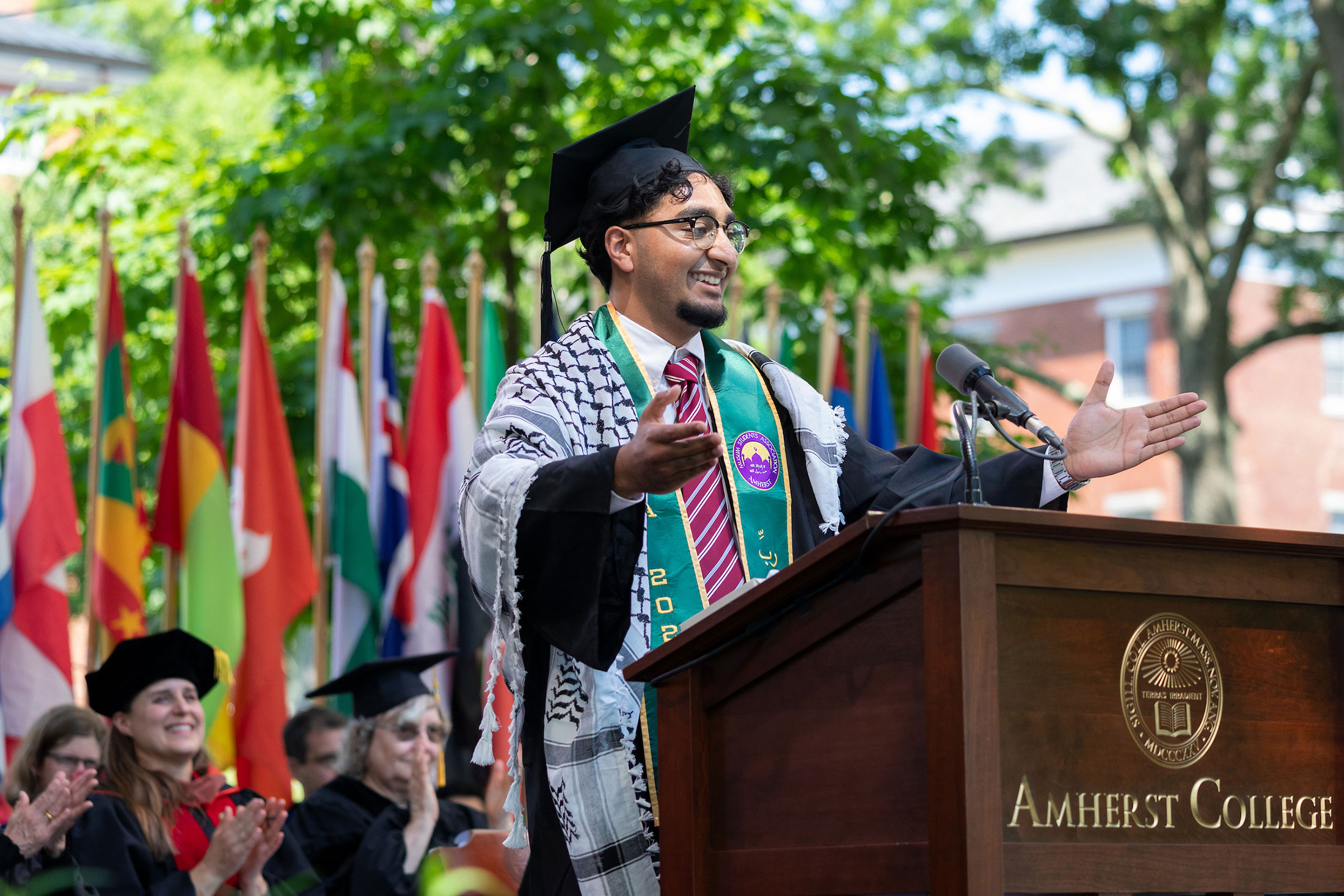 Taha Zafar Ahmad '24 speaking at Commencement.