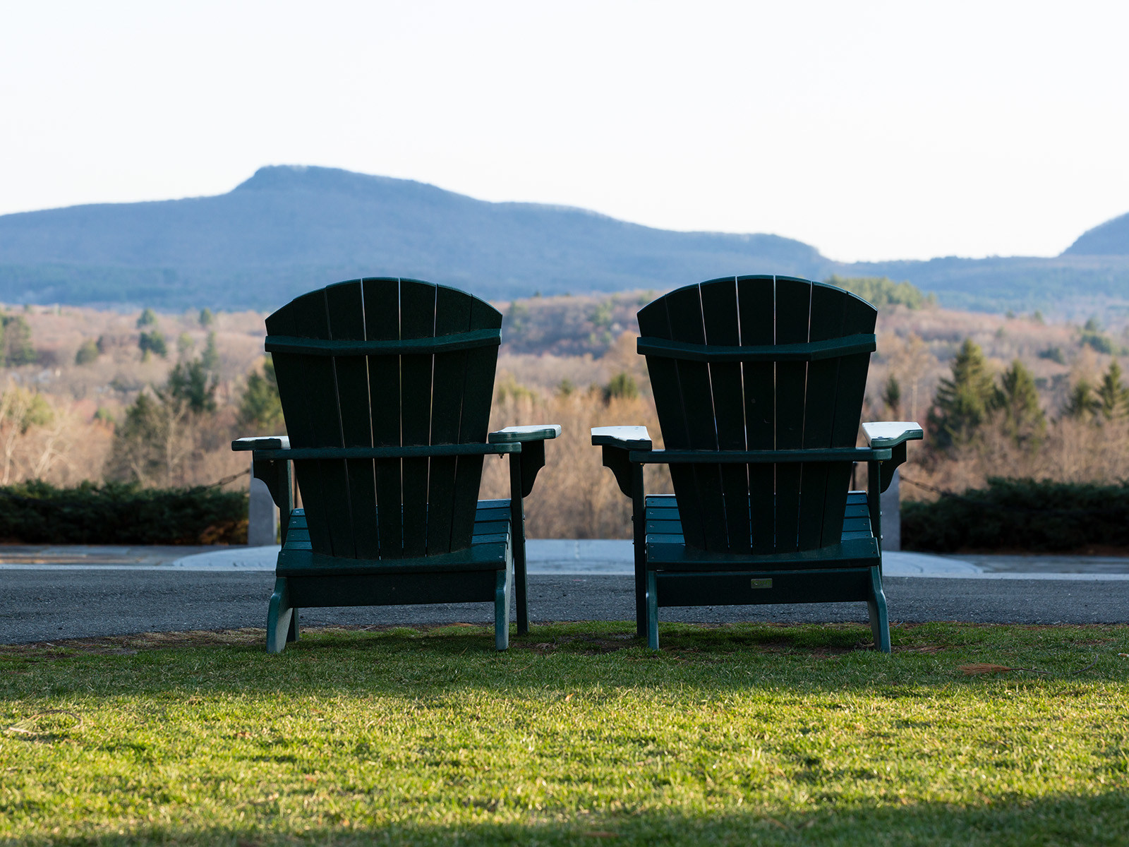 Two chairs overlooking the Mount Holyoke Range
