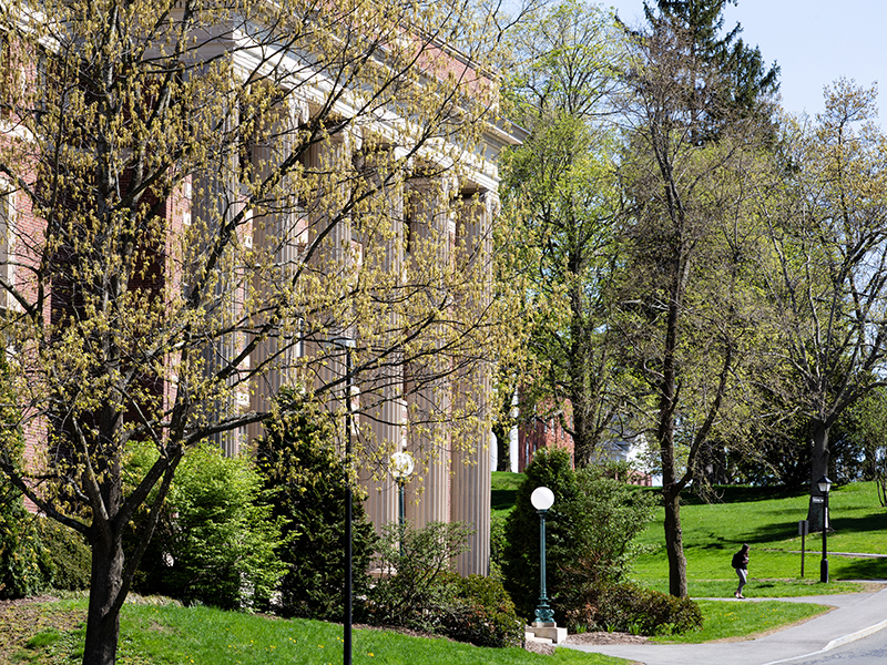 The exterior of Converse Hall in the spring