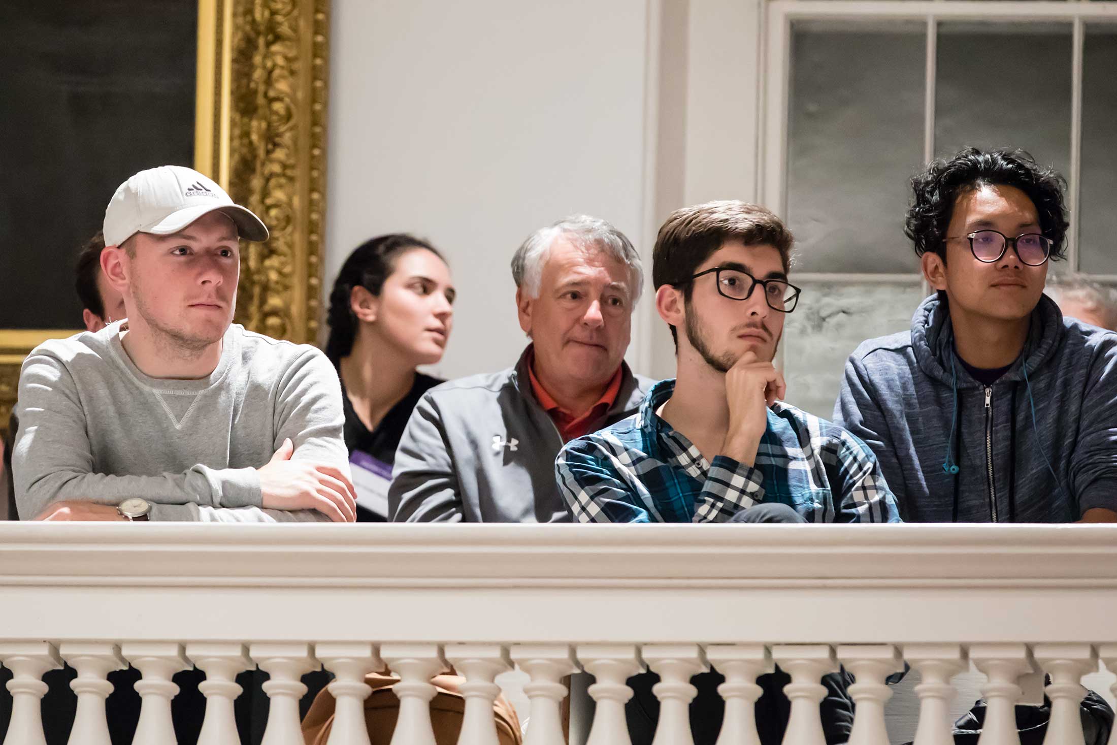 Audience members listening to author Michael Lewis speak at Amherst College