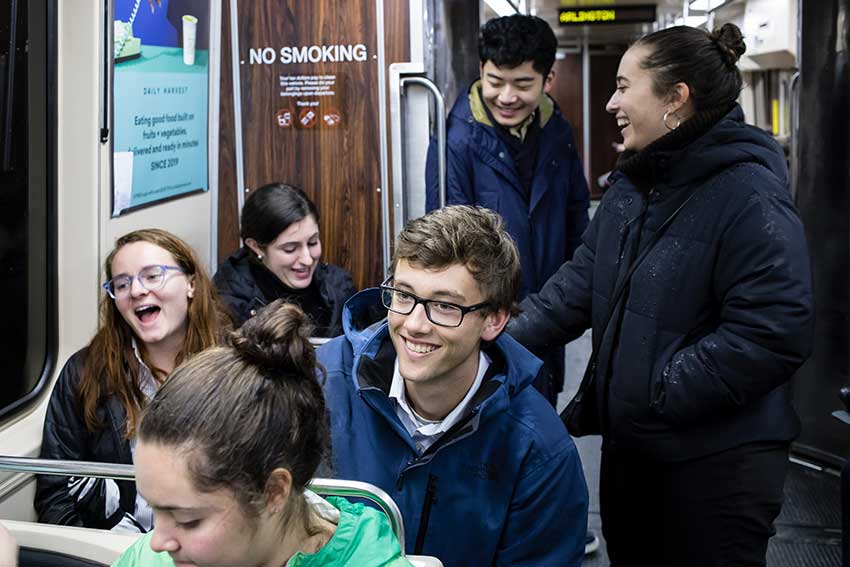 Amherst students on the Metro train in Boston