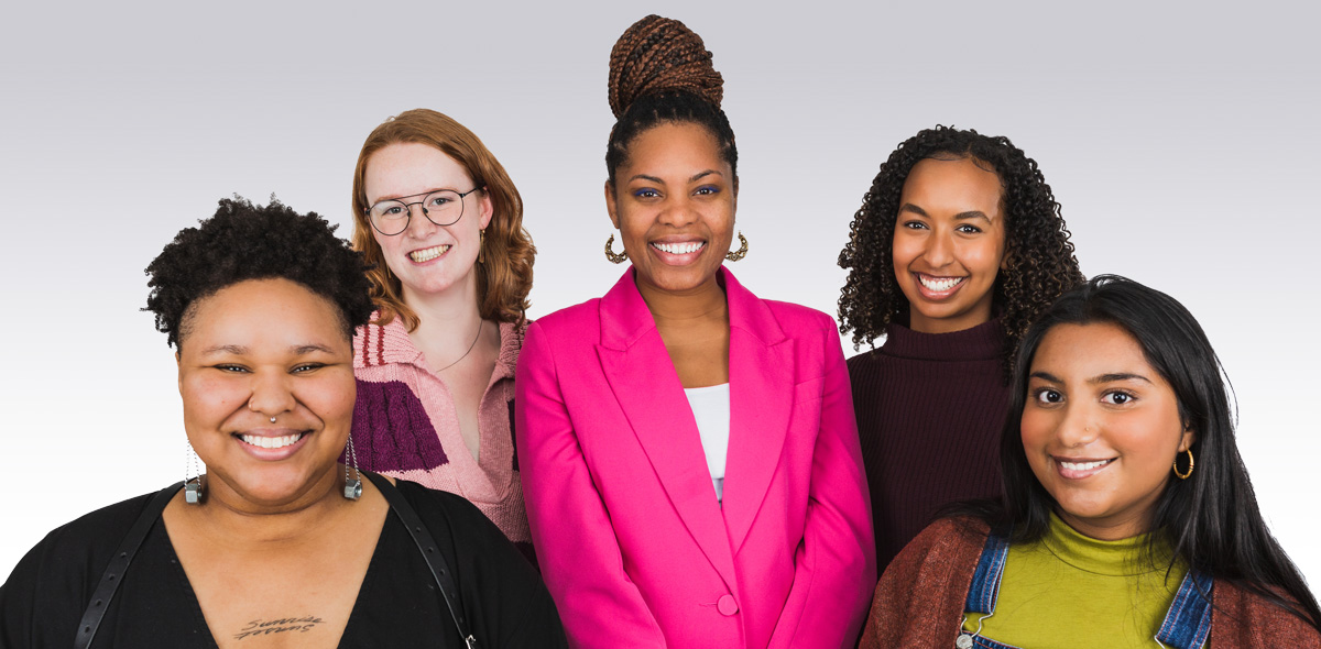 five members of the BREHA collective posing smiling for a group portrait