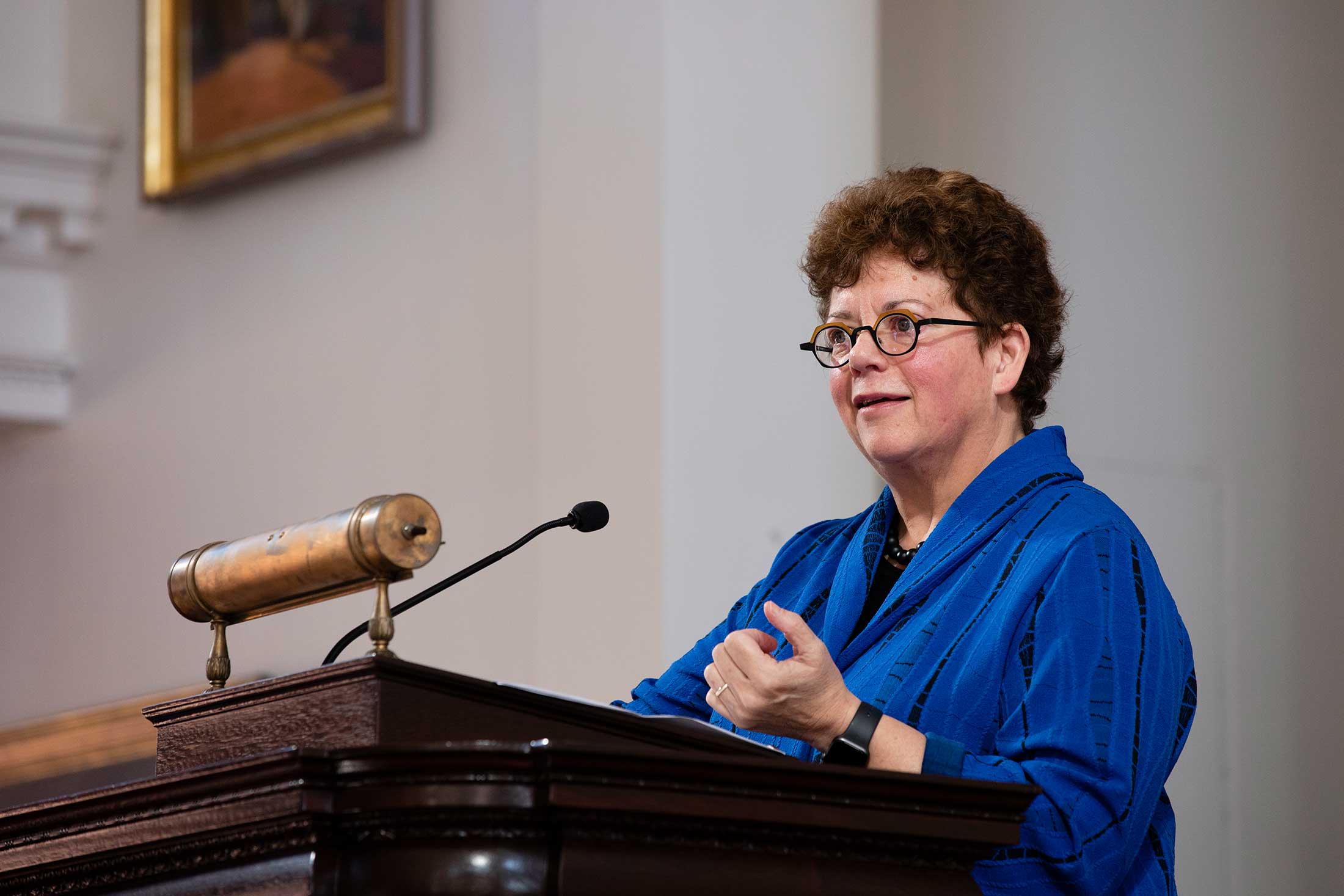 President Biddy Martin behind a podium speaking during Family Weekend 2019