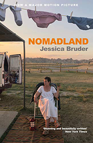 A book jacket showing a woman in a lawn chair in the desert with the title Nomadland