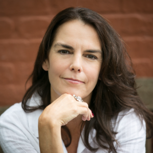 A portrait of a woman with long black hair