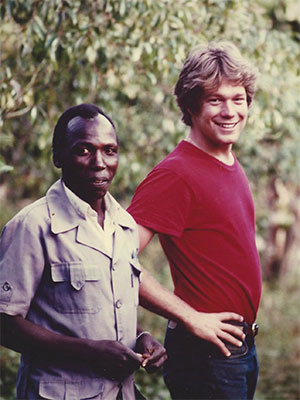 Rand Cooper poses with two unidentified men in Kenya