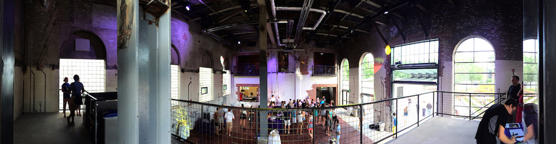 upper and lower levels of the Powerhouse nightclub, with students gathered