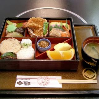 A Japanese bento lunch with soup served at a restaurant