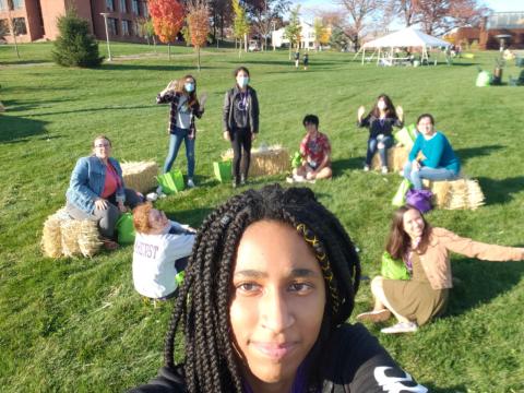 We sit in a circle on the lawn as one friend takes a selfie
