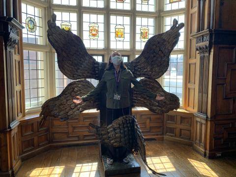 Standing in an art sculpture (which was allowed) at the Mead. Stain glass windows behind me, and my arms are outstretched