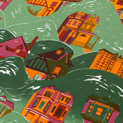 a fabric print with houses and green hills